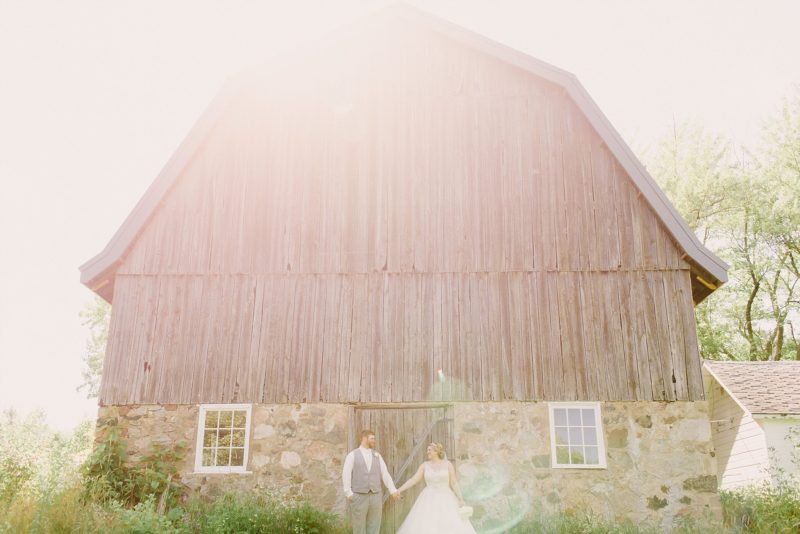 Rustic barn wedding with couple during elopement photography shoot in Wisconsin.