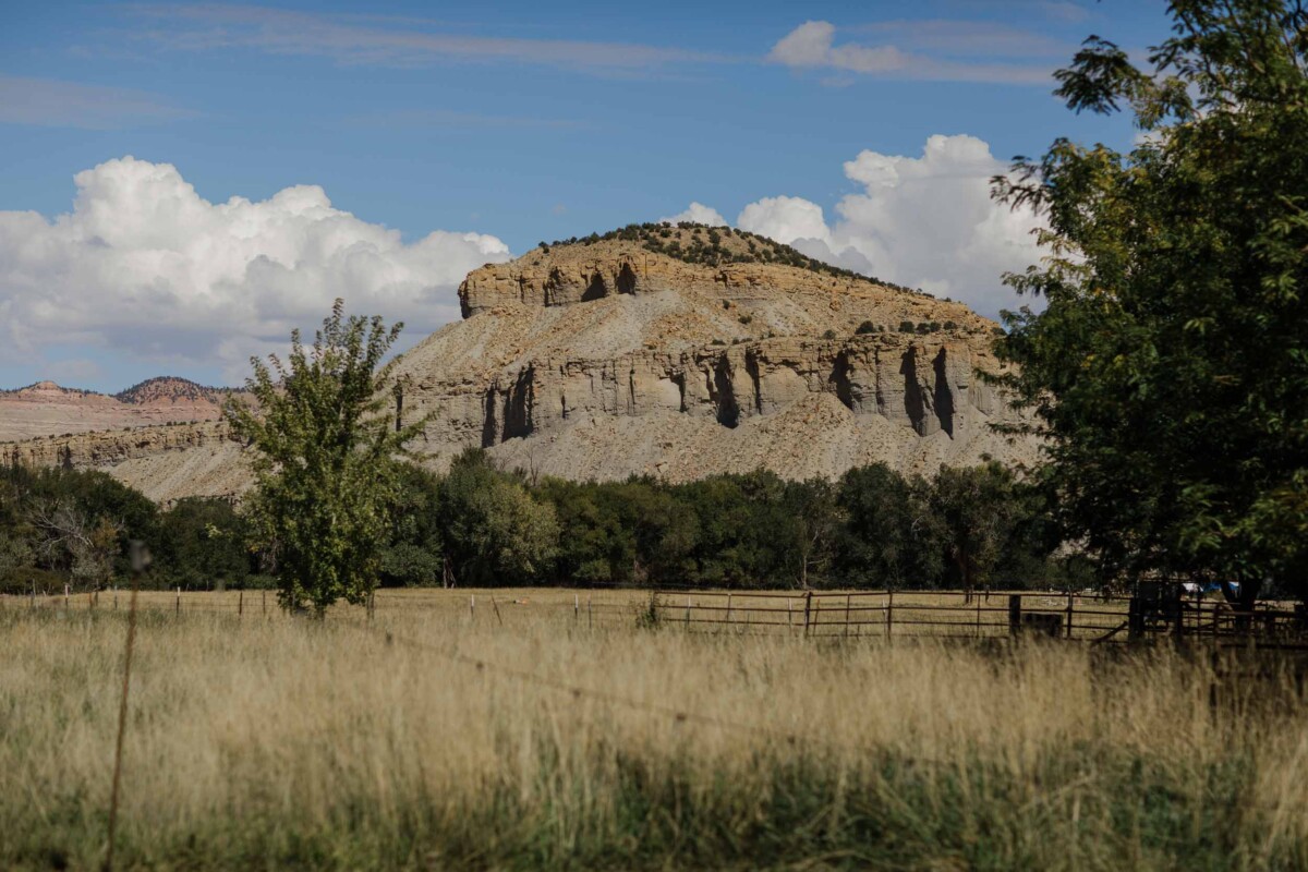 Beautiful rural Utah landscape with rocky formations and open fields for wedding photography.