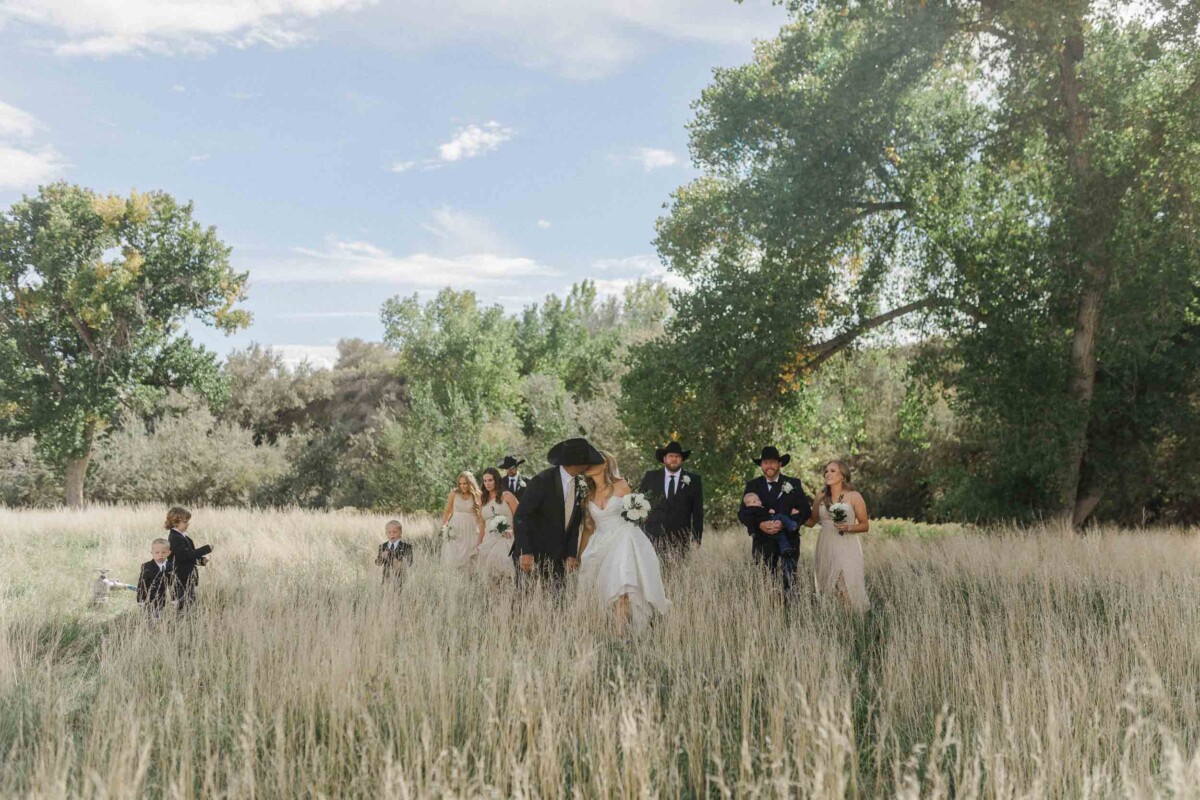 Utah rural wedding with Sean & Davie, outdoor ceremony in a scenic field.