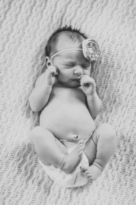baby on knit blanket photo