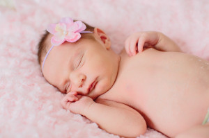 pink sleeping baby photo