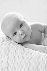 bw baby photo on newborn prop photo