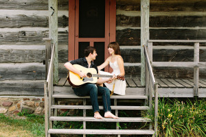 Rustic Outdoor Building Engagement Colby Wisconsin Playing Guitar Photos