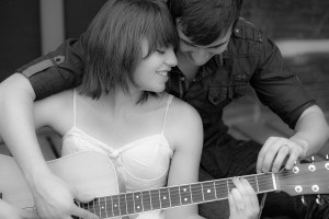 Couple Playing Guitar during engagement Photos