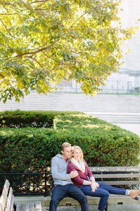 couple sitting under tree