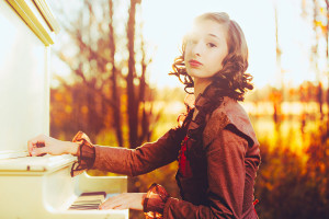 Senior Photos with piano at sunset james stokes colby high school senior