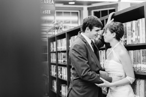 Kissing in library couples photo at wedding