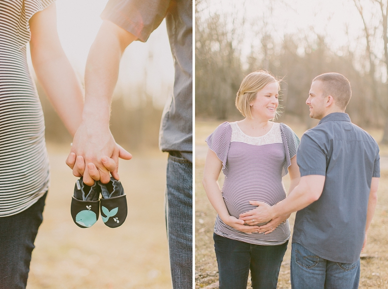 couple holding baby shoes