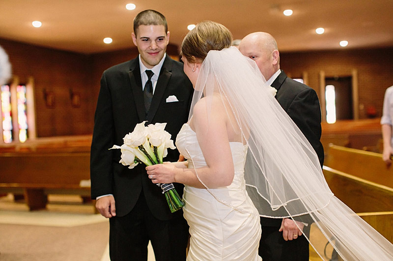 father gives daughter away at wedding photo