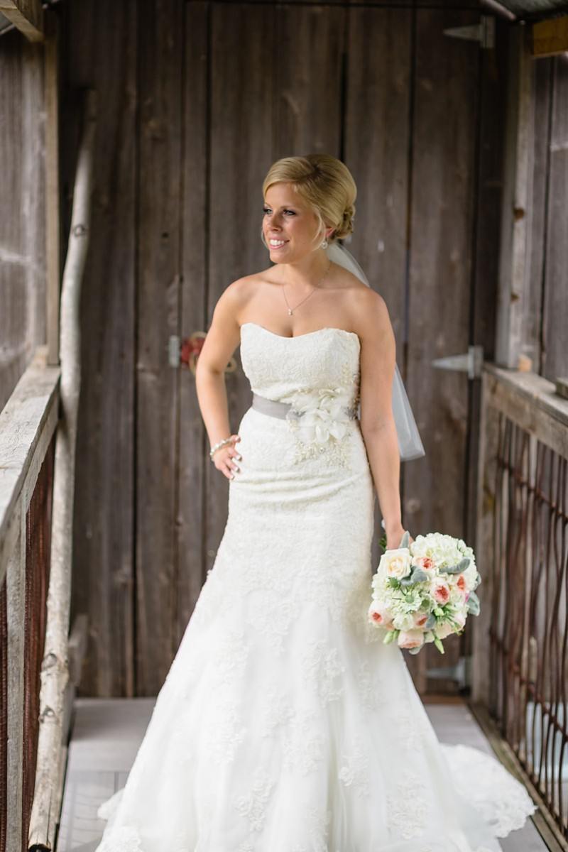 bride and groom at enchanted barn wedding