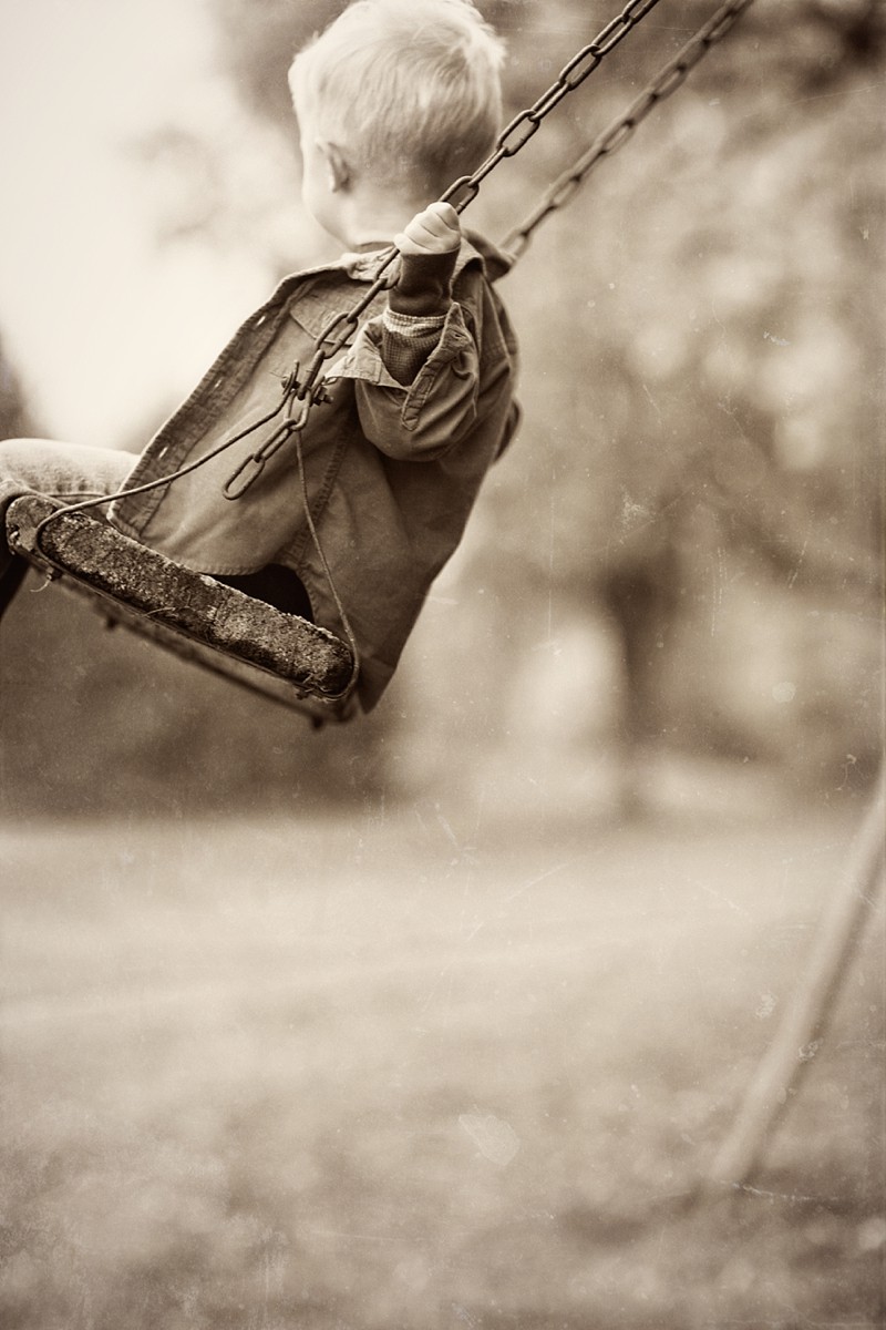 Children Playing on Swingset