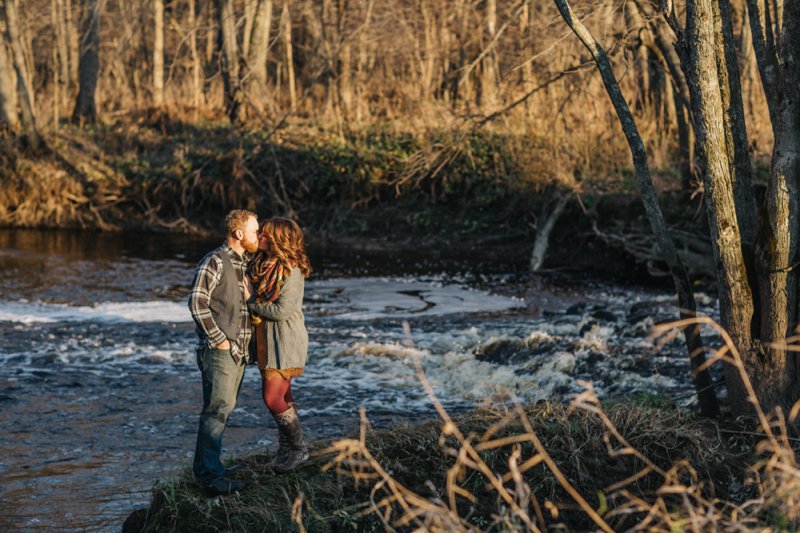 Fall Couple Photos in woods with dogs and campfire