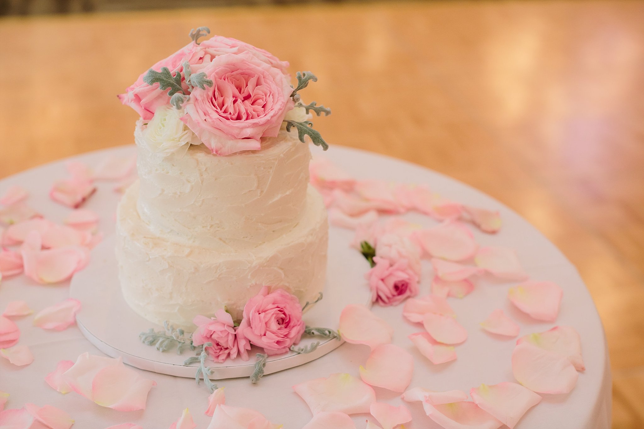 White wedding cake + fresh flowers