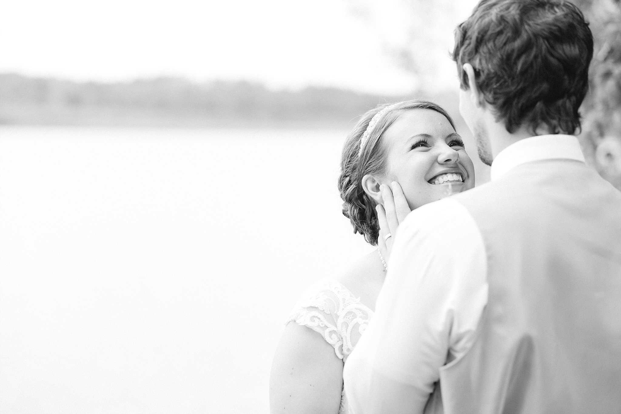 www.james-stokes.com | James Stokes Photography, LLC - Beautiful bride and groom wedding photo by the lake - Wisconsin wedding photographer