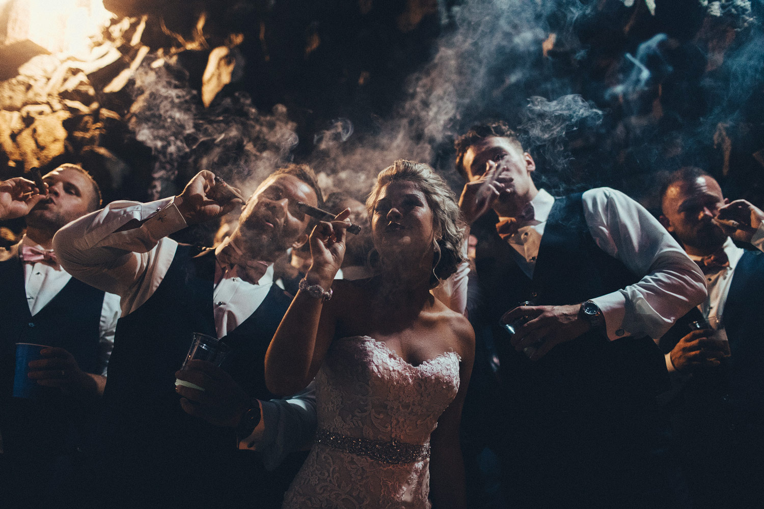 Artistic Wedding Photographer Smoke Photos Cigars on Wedding Night with Groomsmen Bride