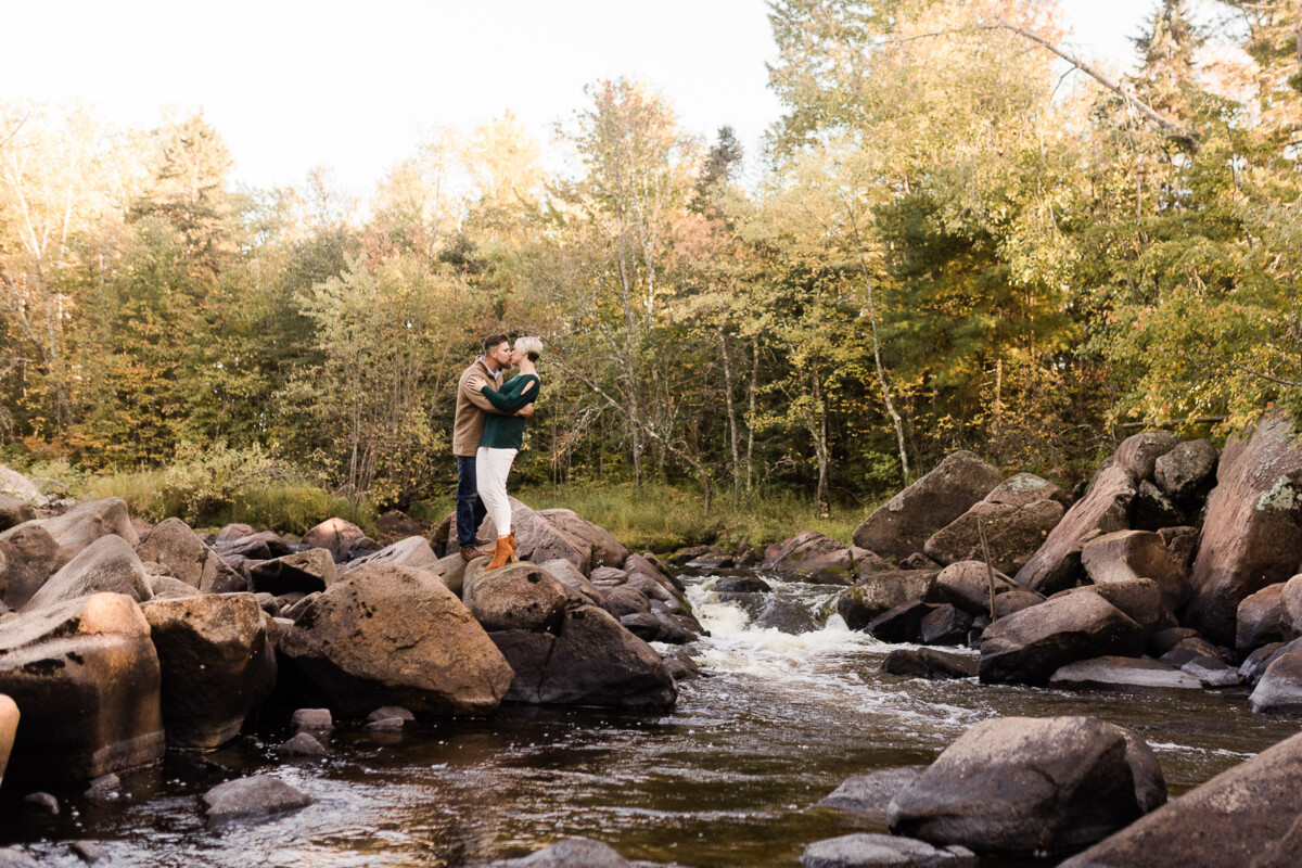 Couple posing at one of the best engagement photo locations in Wisconsin during photoshoot.