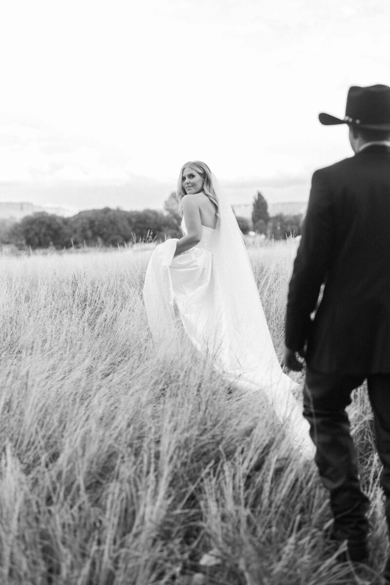 Groom and Bride Midwest cinematic photography shoot in Utah Estate field.