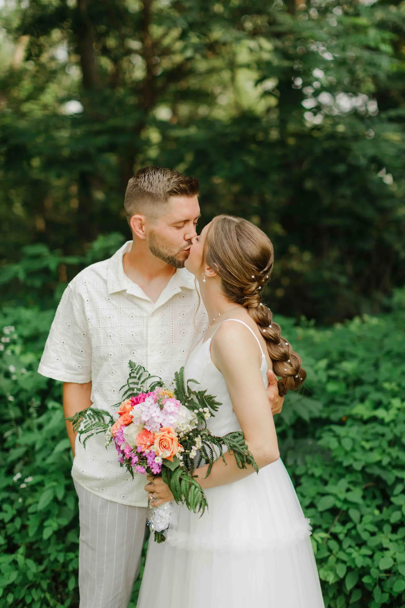 Candid ceremony moment at intimate Wisconsin Dells backyard wedding