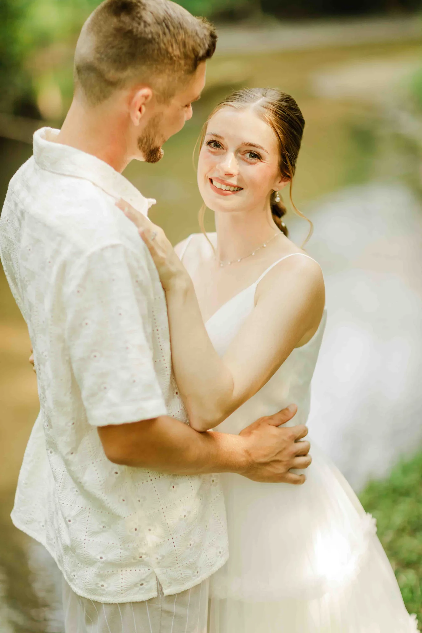 Couple portrait at Wisconsin Dells backyard wedding photographed by James Stokes