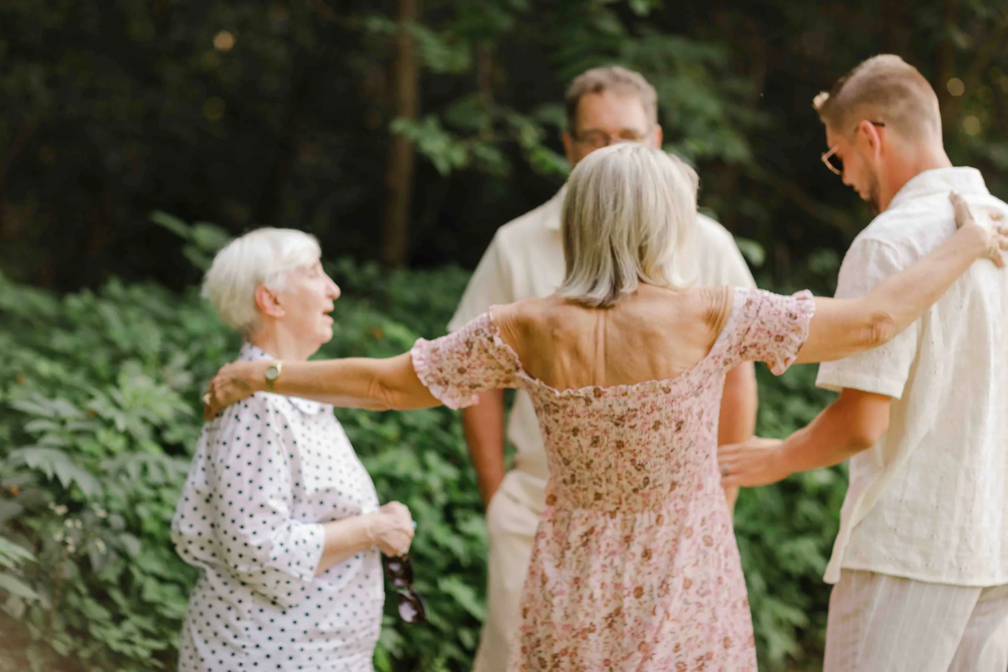 Family portrait at Wisconsin Dells backyard wedding photographed by James Stokes