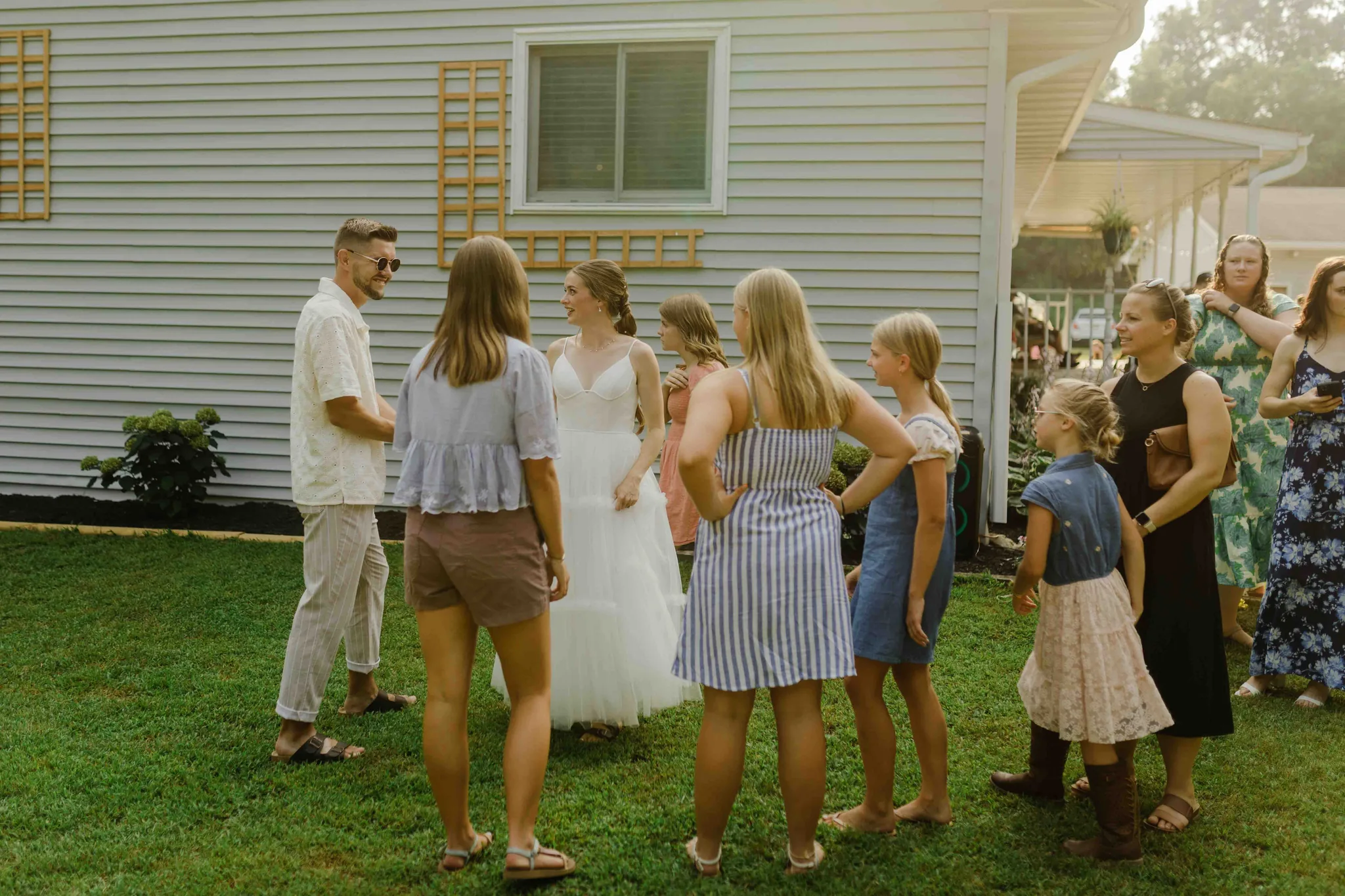 Candid documentary moment at Wisconsin Dells backyard wedding, James Stokes Photography