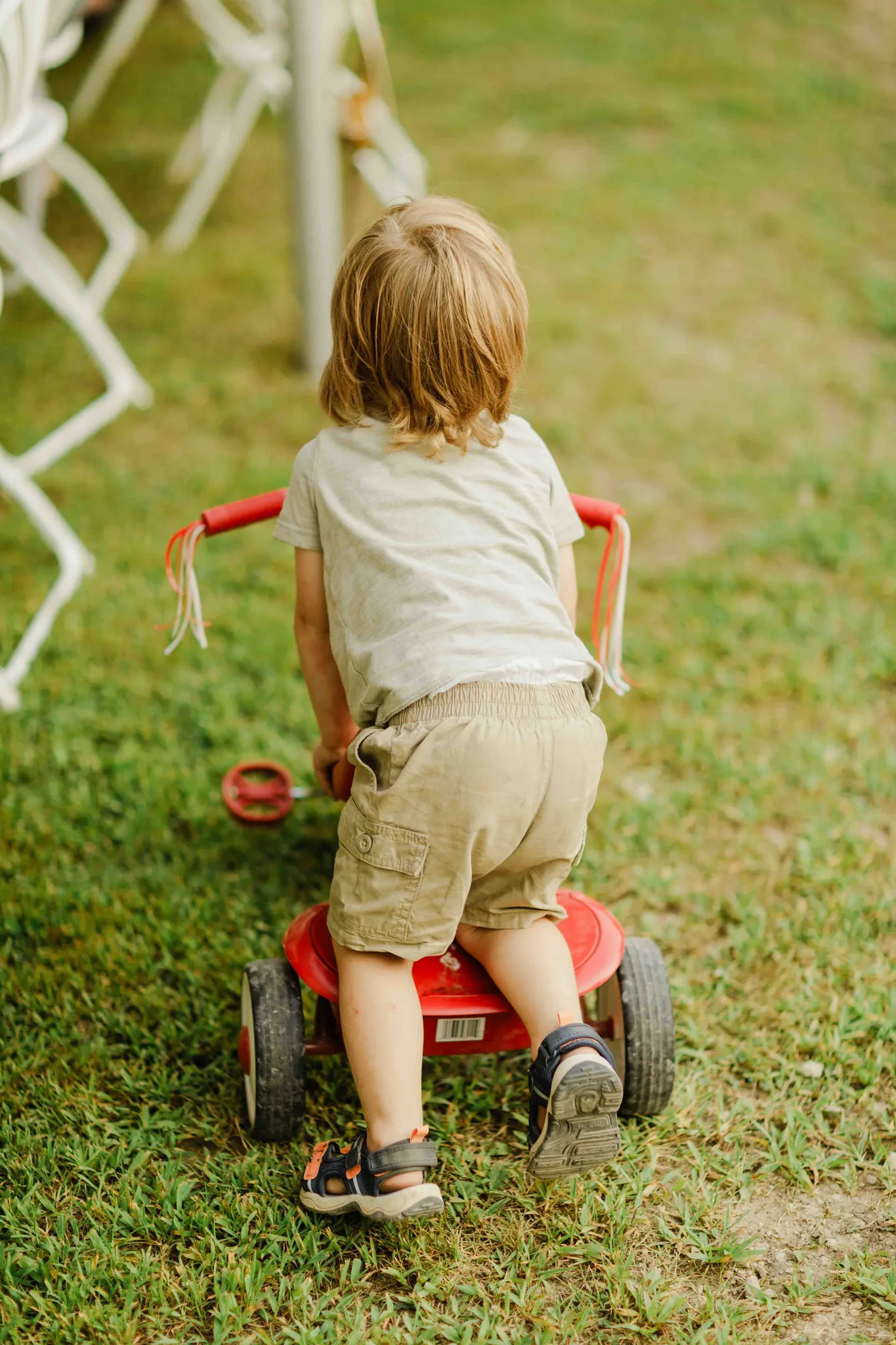 Track team and wedding guests gathering for late night celebration at Wisconsin Dells backyard wedding